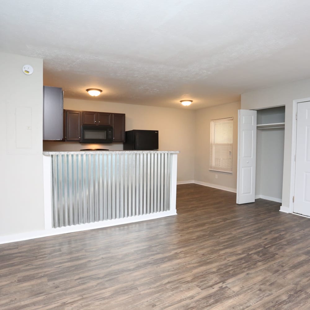 Kitchen and living room at Clifton Ridge Apartments in Louisville, Kentucky