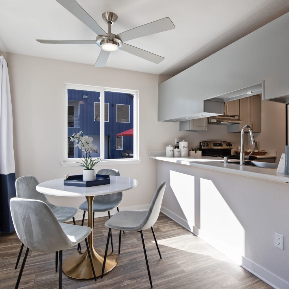 Spacious and modern open-concept layout with hardwood floors in a model home at Sofi Lakeside in Everett, Washington