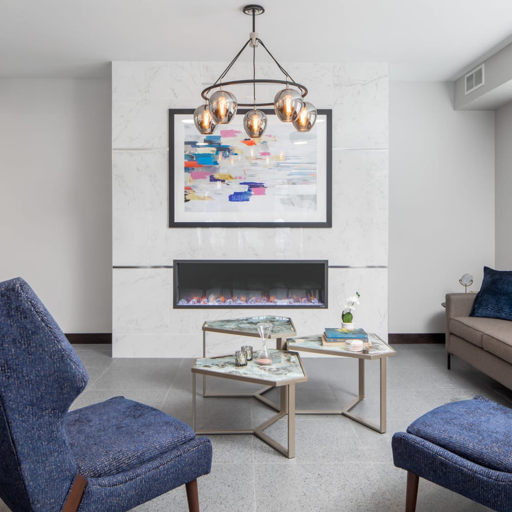 Bright living room with a fireplace at Oaks Minnehaha Longfellow in Minneapolis, Minnesota