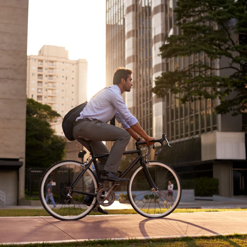 Resident riding their bike in Minneapolis, Minnesota near Oaks Minnehaha Longfellow