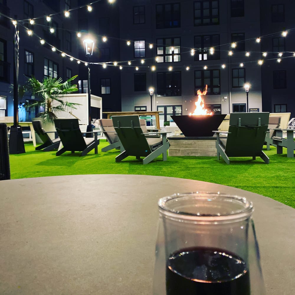 Resident enjoying wine outside of 511 Meeting in Charleston, South Carolina
