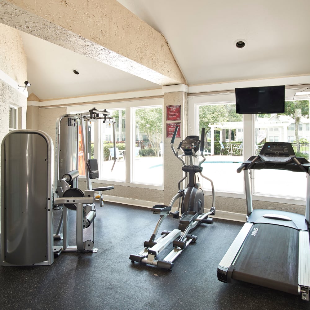 A fitness center with a treadmill at Avenue @Creekbridge in Brandon, Florida