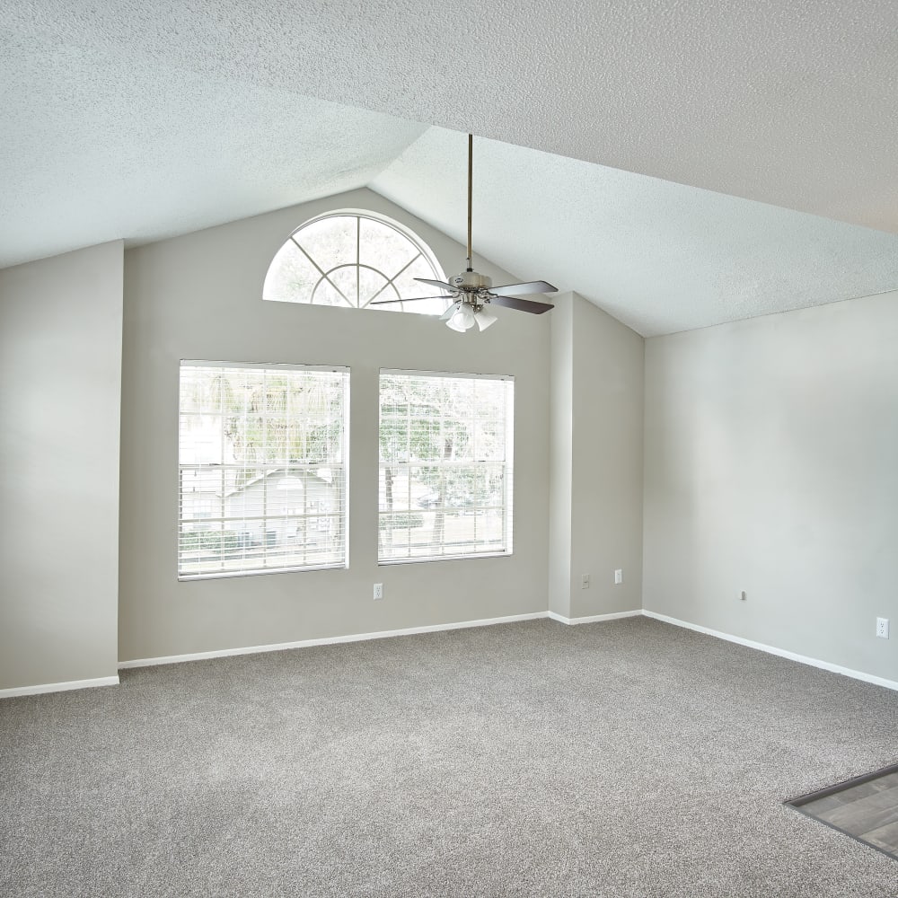 A large living room with lots of natural lighting at Avenue @Creekbridge in Brandon, Florida