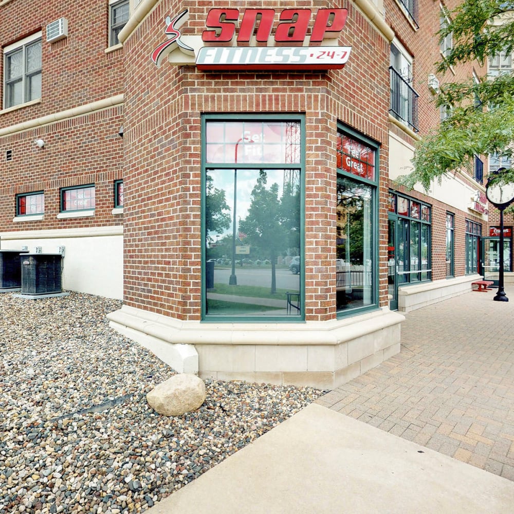 Exterior view of the SNAP Fitness location on the ground level of our building at Oaks Hiawatha Station in Minneapolis, Minnesota