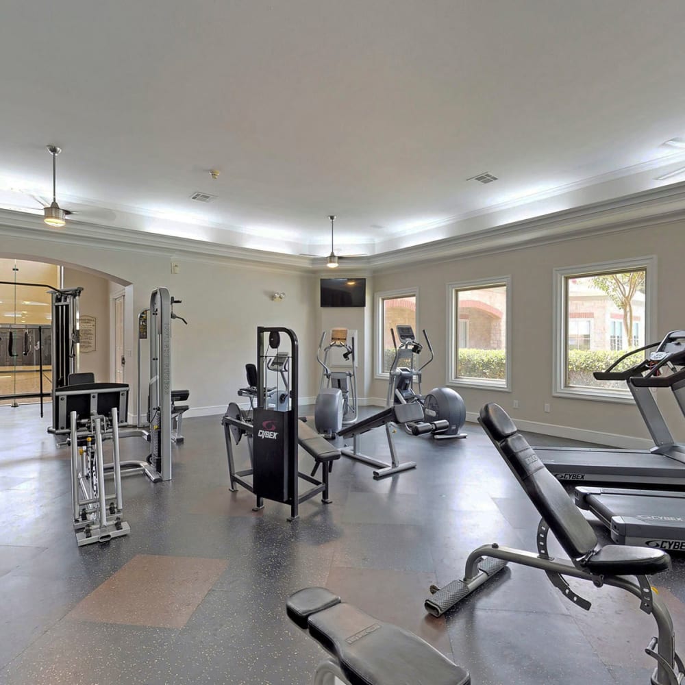 Exercise machines in the fitness center at Oaks Riverchase in Coppell, Texas