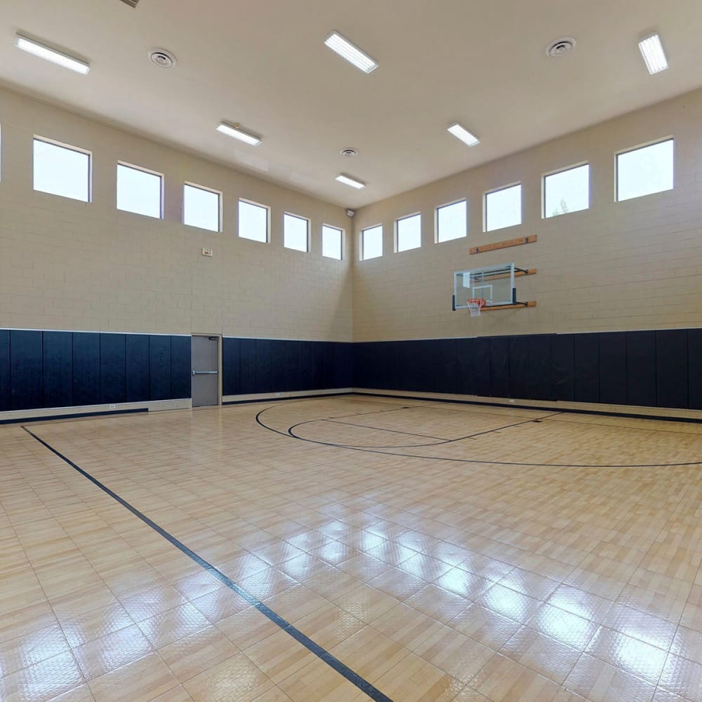 Indoor basketball court at Oaks Riverchase in Coppell, Texas