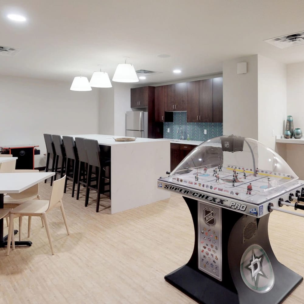 Demonstration kitchen with bar seating in the game room at Oaks Union Depot in St Paul, Minnesota