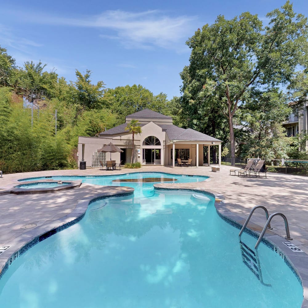 Resort-style swimming pool at Oaks White Rock in Dallas, Texas