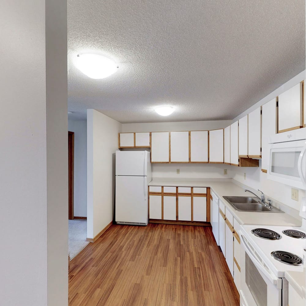 Beautiful bright kitchen at Oaks Lincoln Apartments & Townhomes in Edina, Minnesota