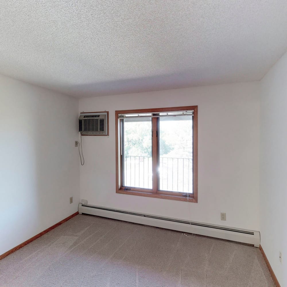 Large bedroom windows at Oaks Lincoln Apartments & Townhomes in Edina, Minnesota