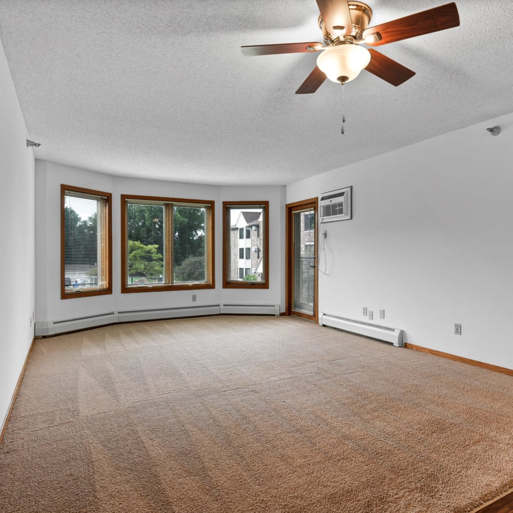 Large living room windows at Oaks Lincoln Apartments & Townhomes in Edina, Minnesota