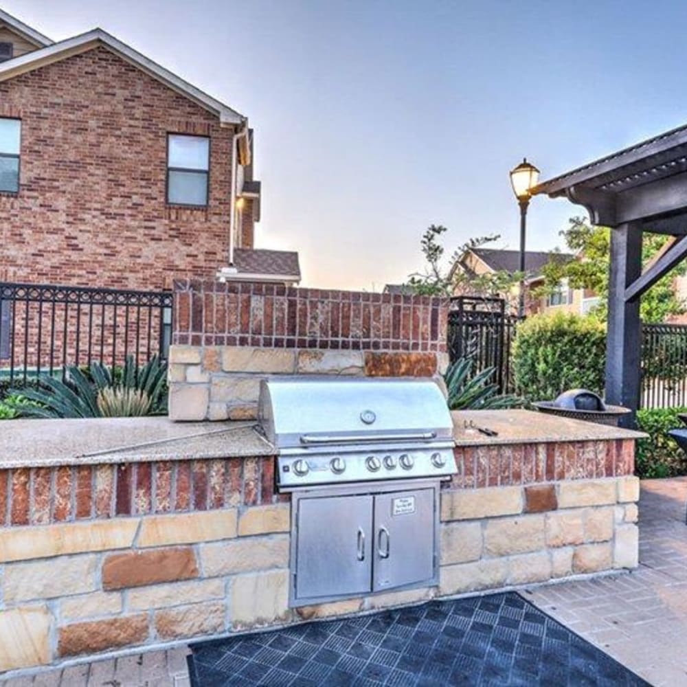 Covered Outdoor Kitchen at Grand Villas Apartments in Katy, Texas