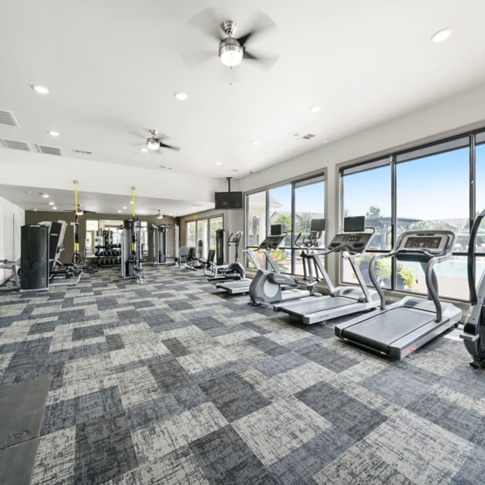 Fitness center at Grand Villas Apartments in Katy, Texas