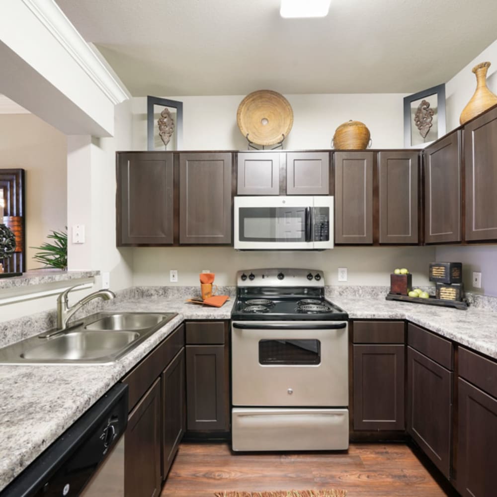 Kitchen with cabinet at River Pointe in Conroe, Texas