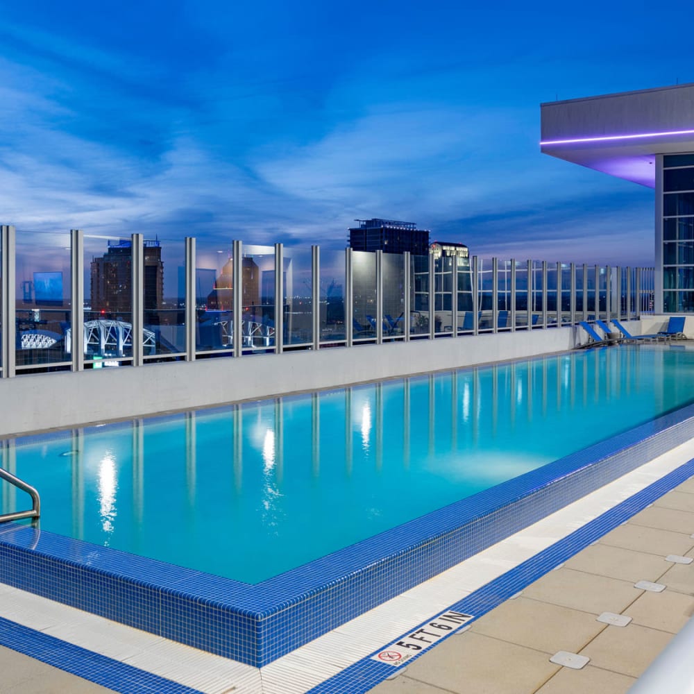 Dusk view of the rooftop lap pool at CitiTower in Orlando, Florida