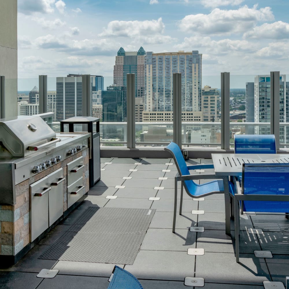 Rooftop barbecue area with gas grills at CitiTower in Orlando, Florida