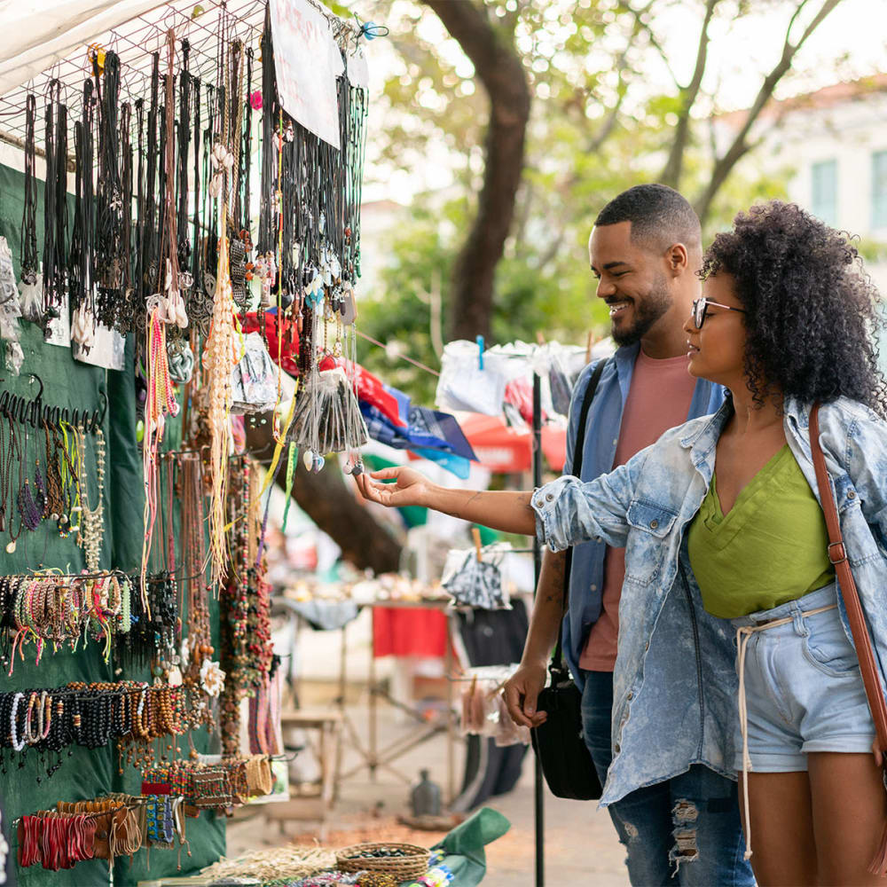 Resident couple out shopping at an open-air market near Mission Rock at Novato in Novato, California