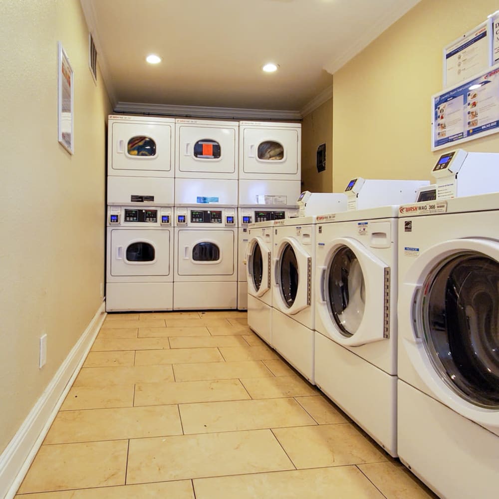 Laundry room with washers and dryers at our Ignacio Place community at Mission Rock at Novato in Novato, California