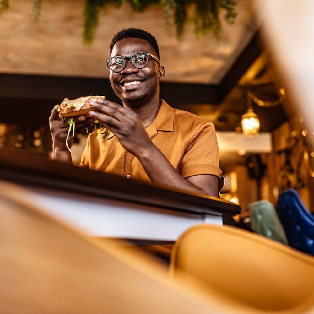 Resident about to enjoy a delicious sandwich at his favorite restaurant near Mission Rock at North Bay in Novato, California