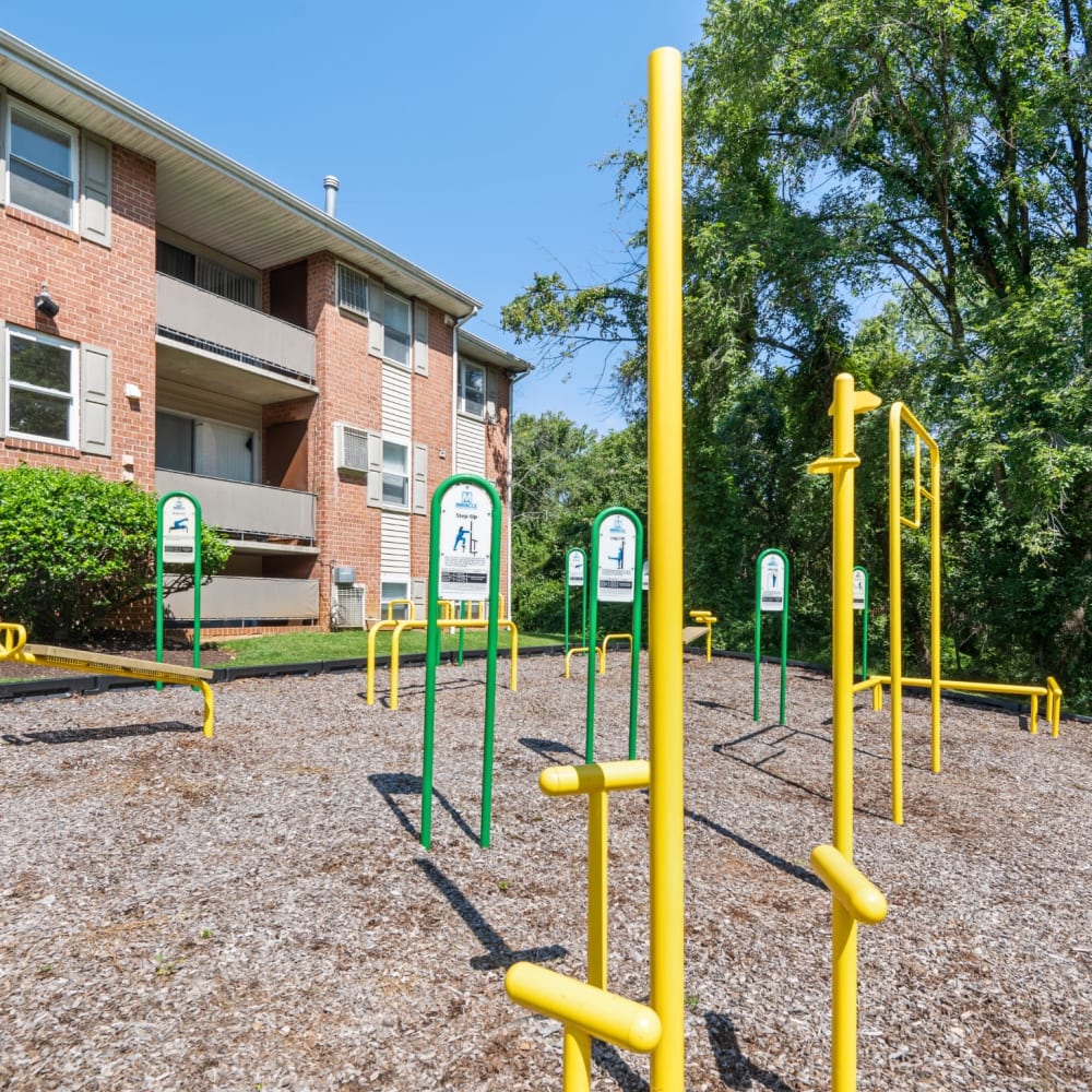 Outdoor fitness equipment at Cedar Gardens and Towers Apartments & Townhomes in Windsor Mill, Maryland
