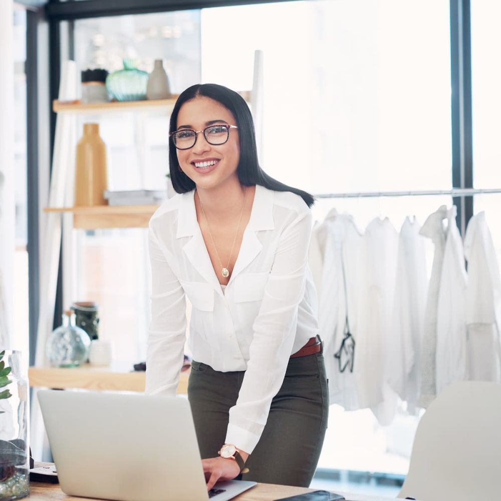 Businesswoman working on her craft at Oaks Centropolis Apartments in Kansas City, Missouri