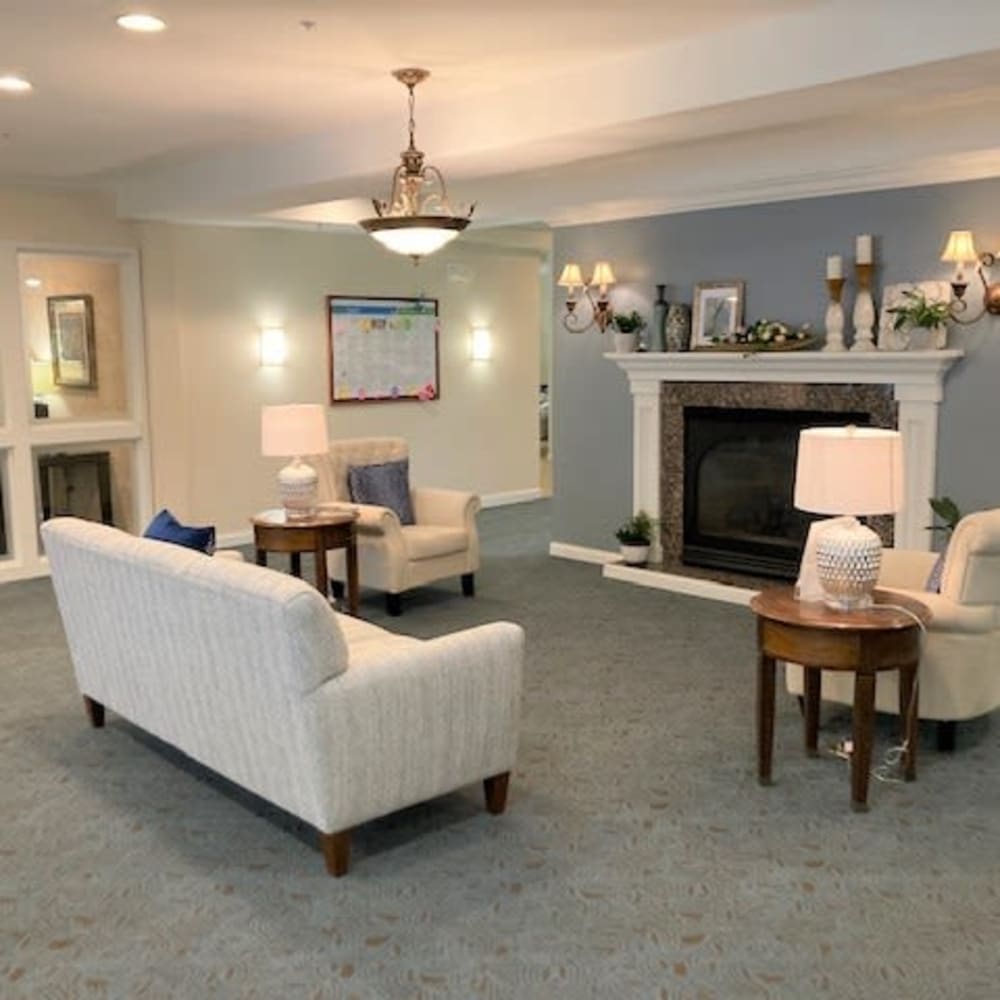 Community area with fireplace and elegant furniture at Randall Residence of McHenry in McHenry, Illinois