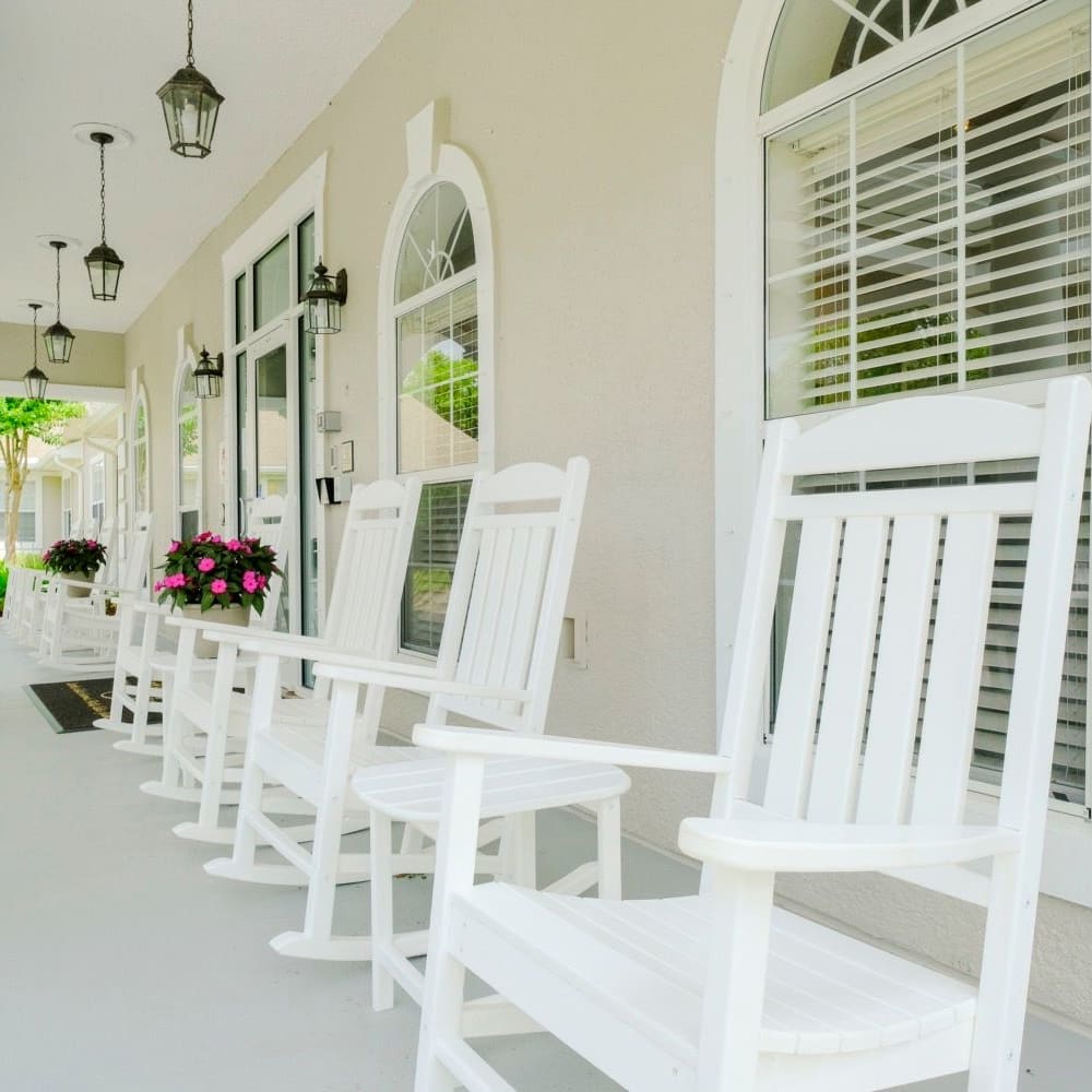 Covered outdoor seating area at Grand Villa of Palm Coast in Palm Coast, Florida