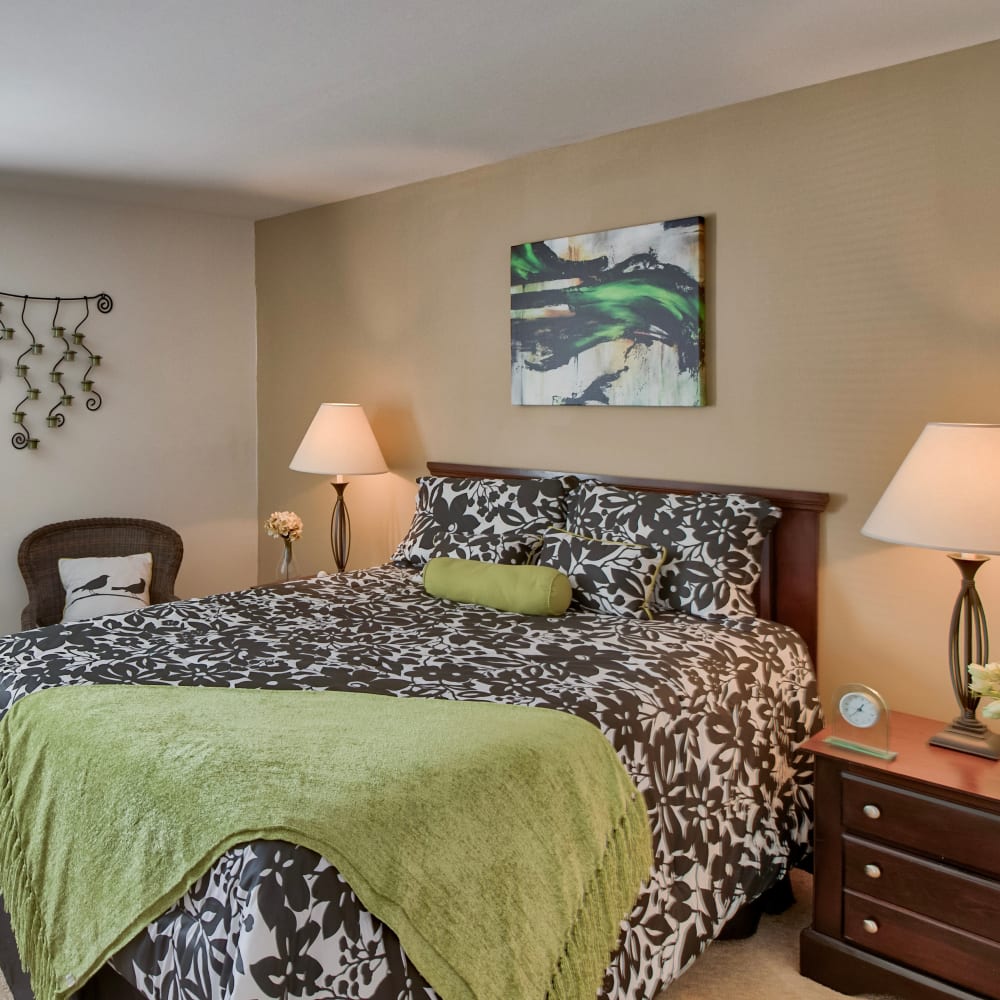 bedroom with king size bed at Brookside Village Apartments in Virginia Beach, Virginia