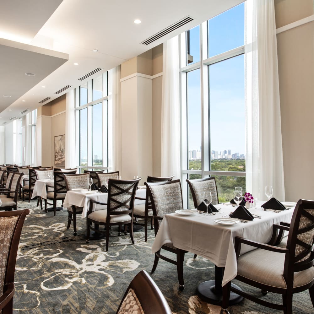 Large dinning hall with excellent views at The Village of Southampton in Houston, Texas