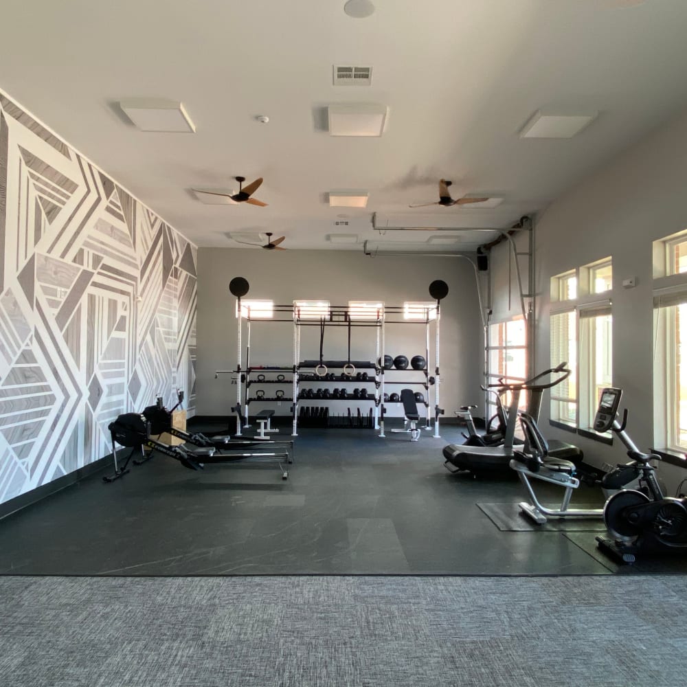 Modern fitness center at Center West Apartments in Midlothian, Virginia