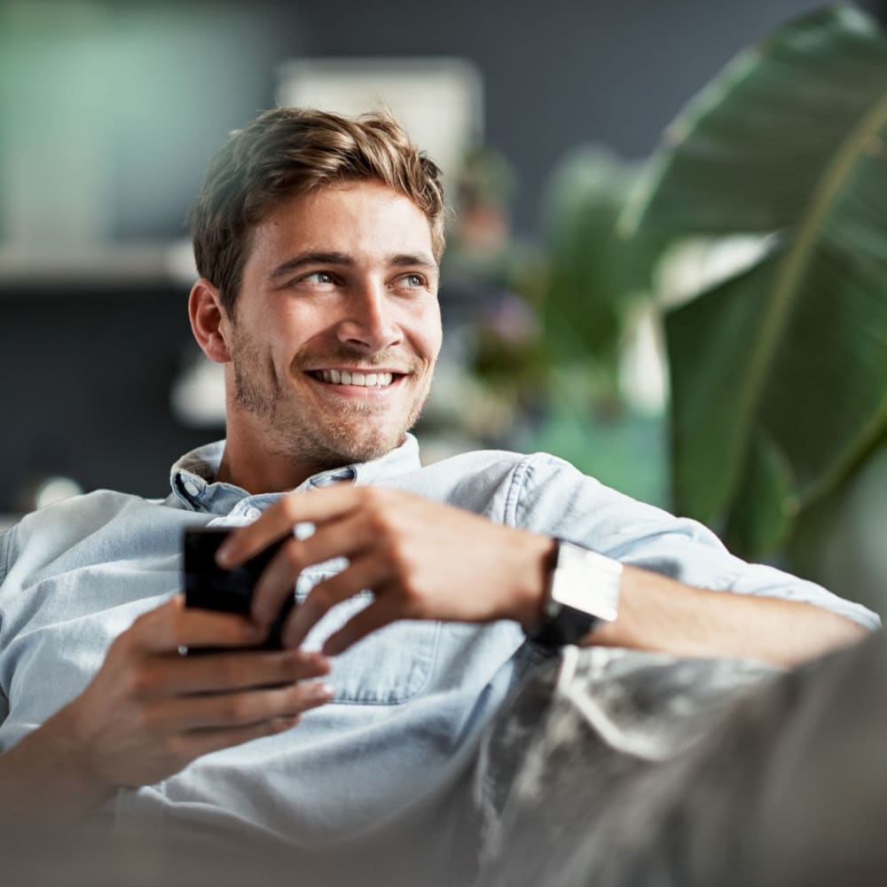 Man relaxing at Alma Hub 121 in McKinney, Texas