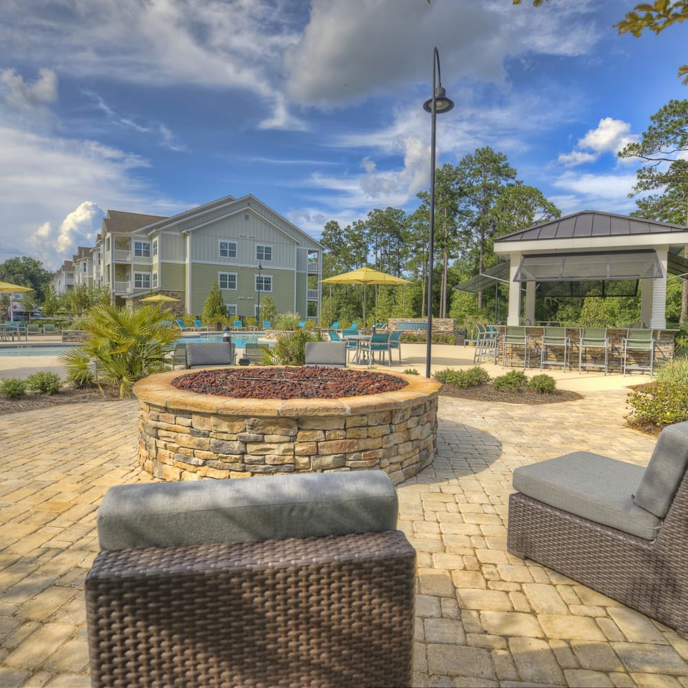 Outdoor seating around a firepit at Lullwater at Blair Stone in Tallahassee, Florida