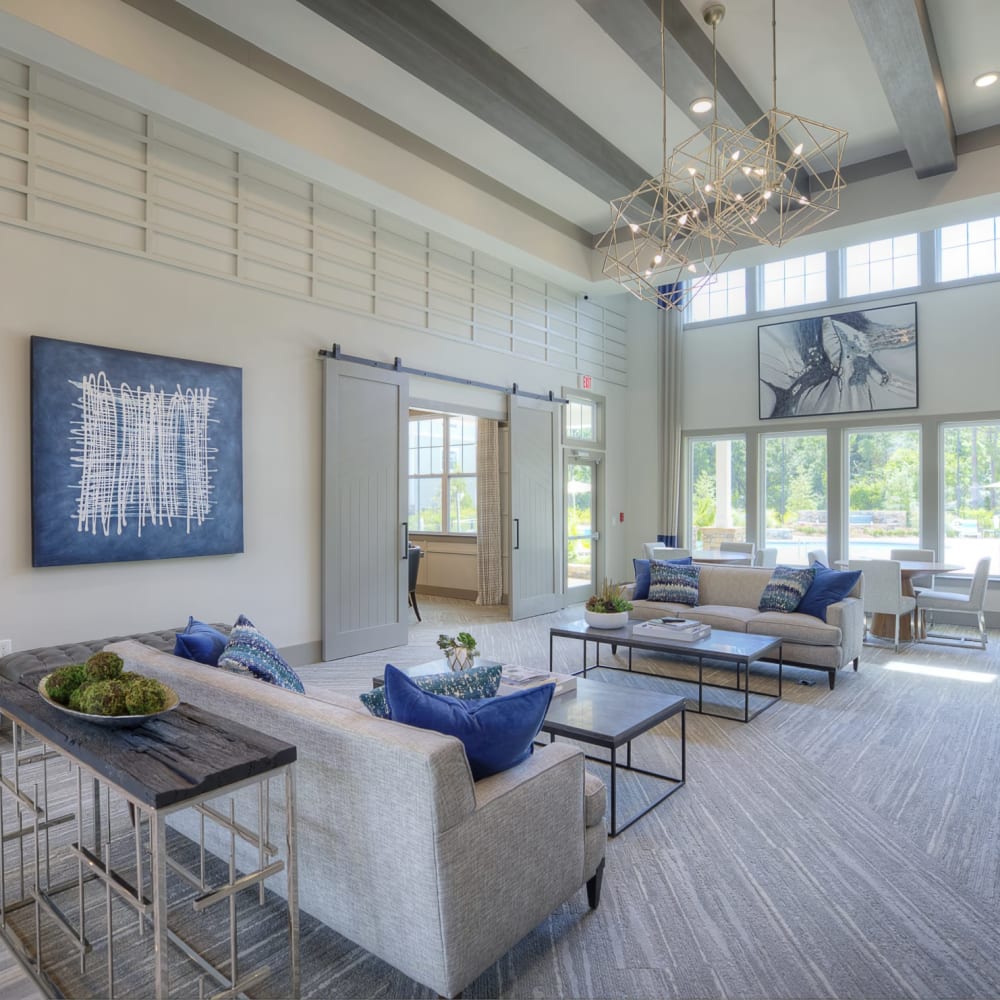 Comfortable lounge seating in the community clubhouse at Lullwater at Blair Stone in Tallahassee, Florida