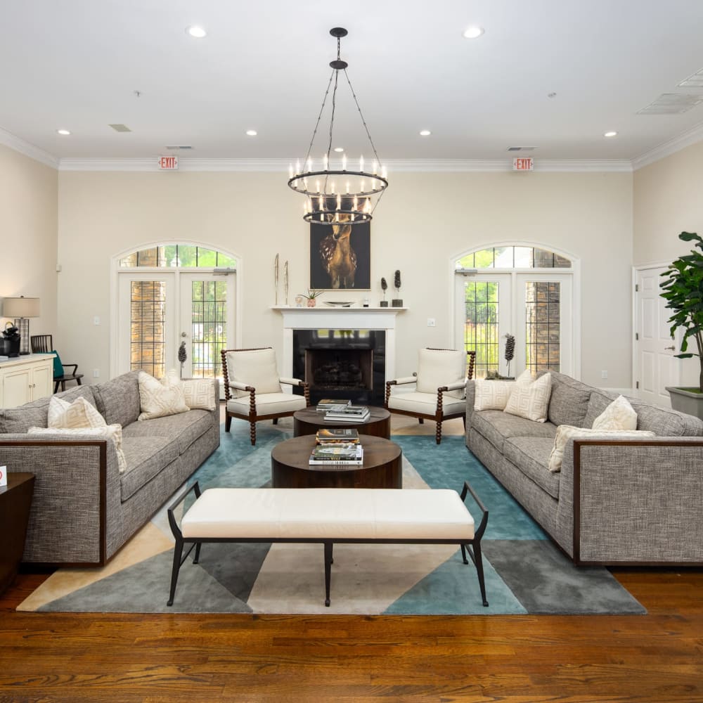 Comfortable fireside seating in the community clubhouse at Heritage at Riverstone in Canton, Georgia