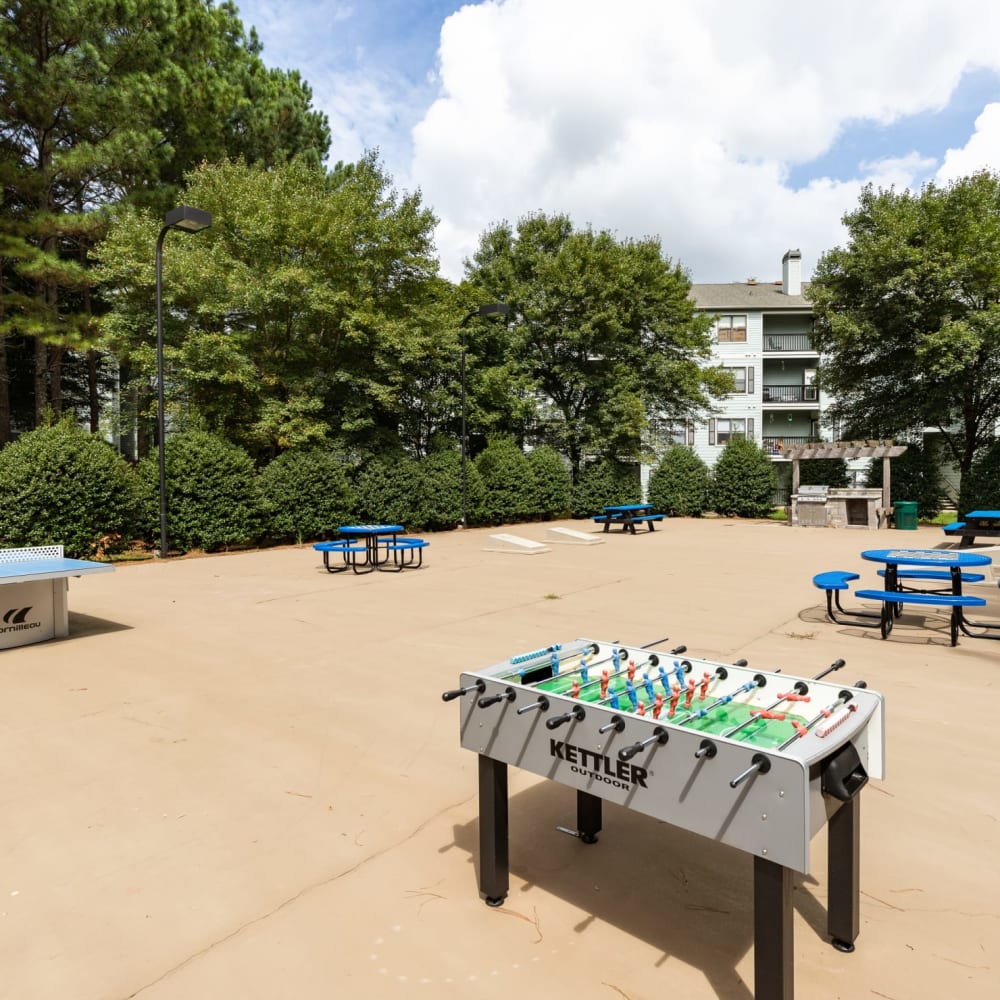 A foosball table in the outdoor community space at Heritage at Riverstone in Canton, Georgia