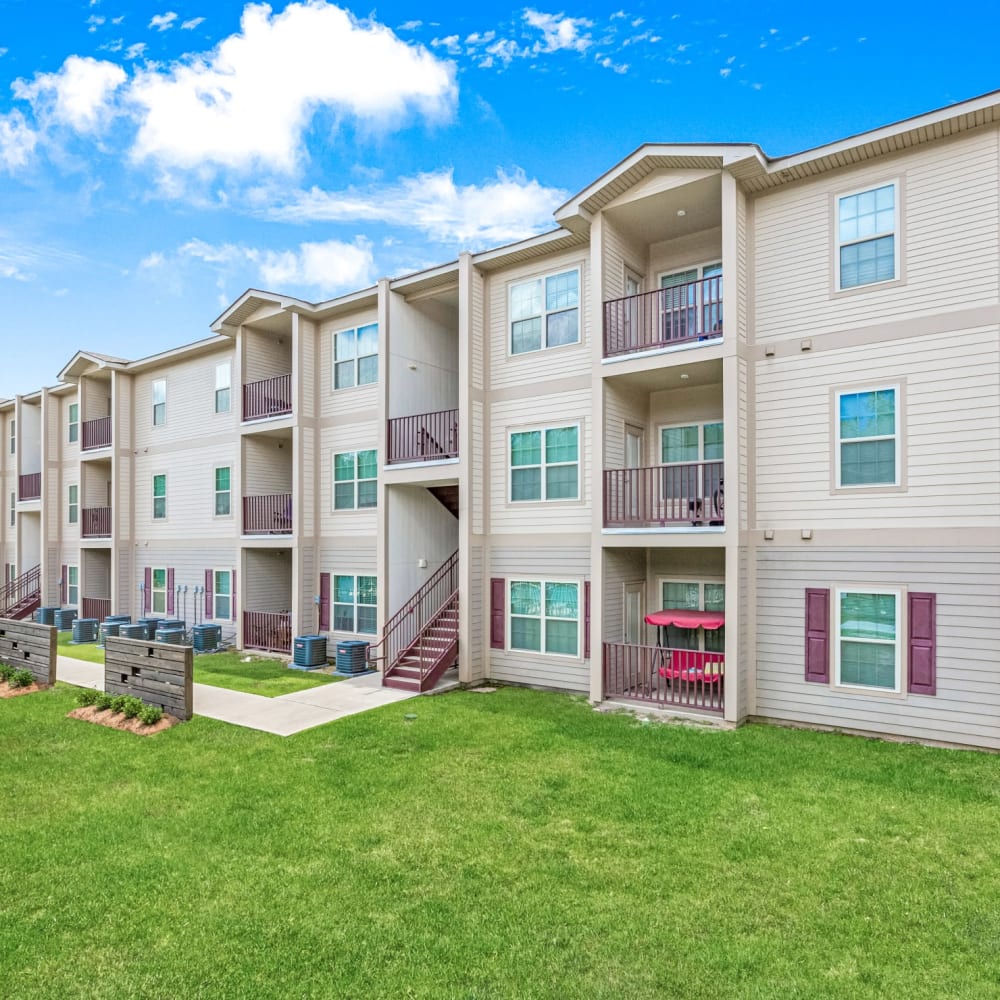 Exterior of an apartment building at Reagan Crossing in Covington, Louisiana