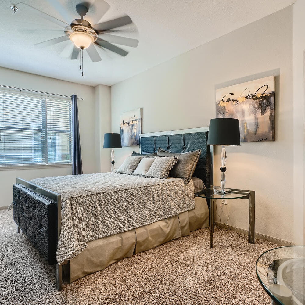 Comfy bedroom at Grand Villas Apartments in Katy, Texas