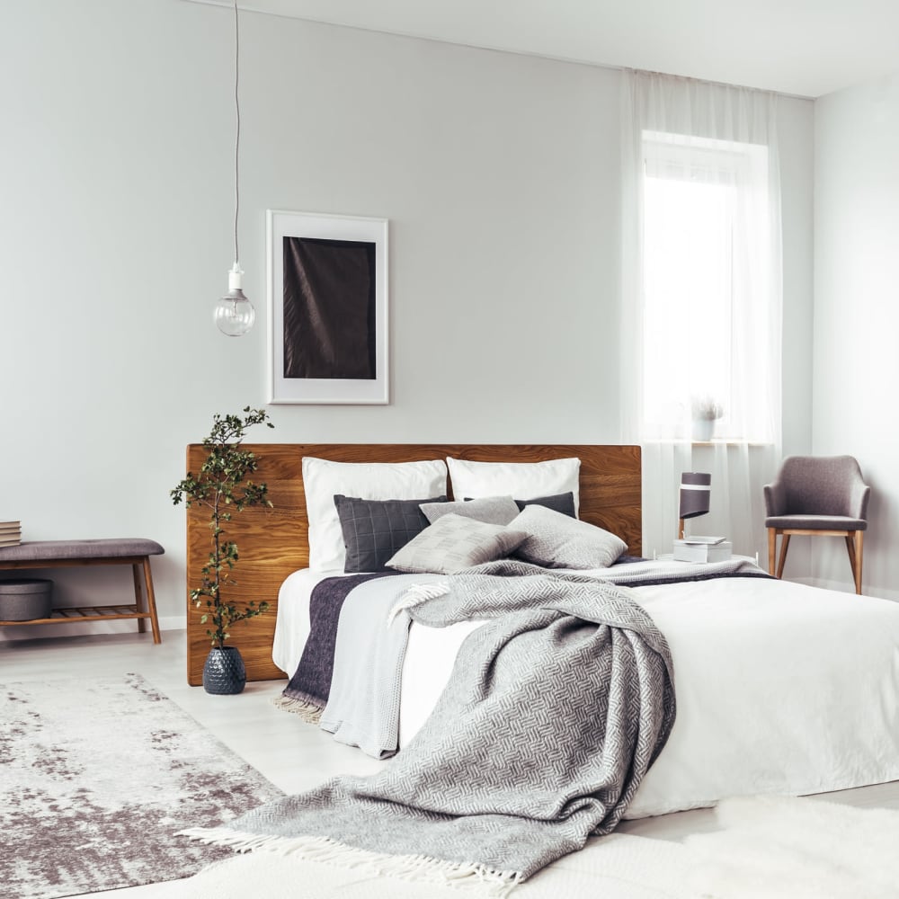 Well-furnished model bedroom in an apartment home at Altoview Apartment Homes in Charlottesville, Virginia