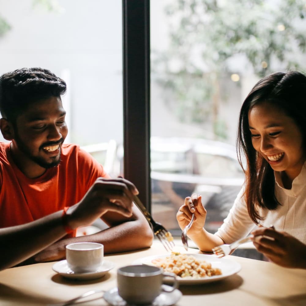 Residents enjoying a meal at their favorite spot near Center West Apartments in Midlothian, Virginia