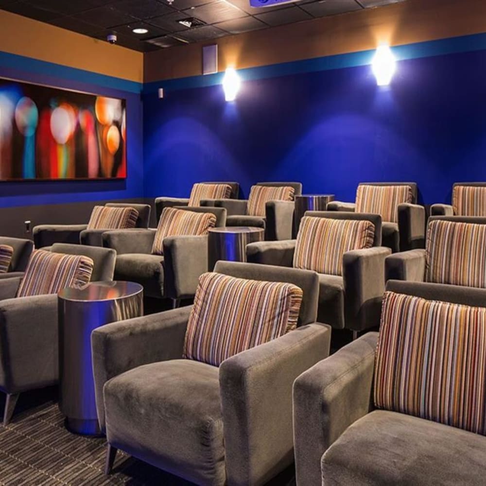 Seating in the theater room at Residences at Congressional Village in Rockville, Maryland