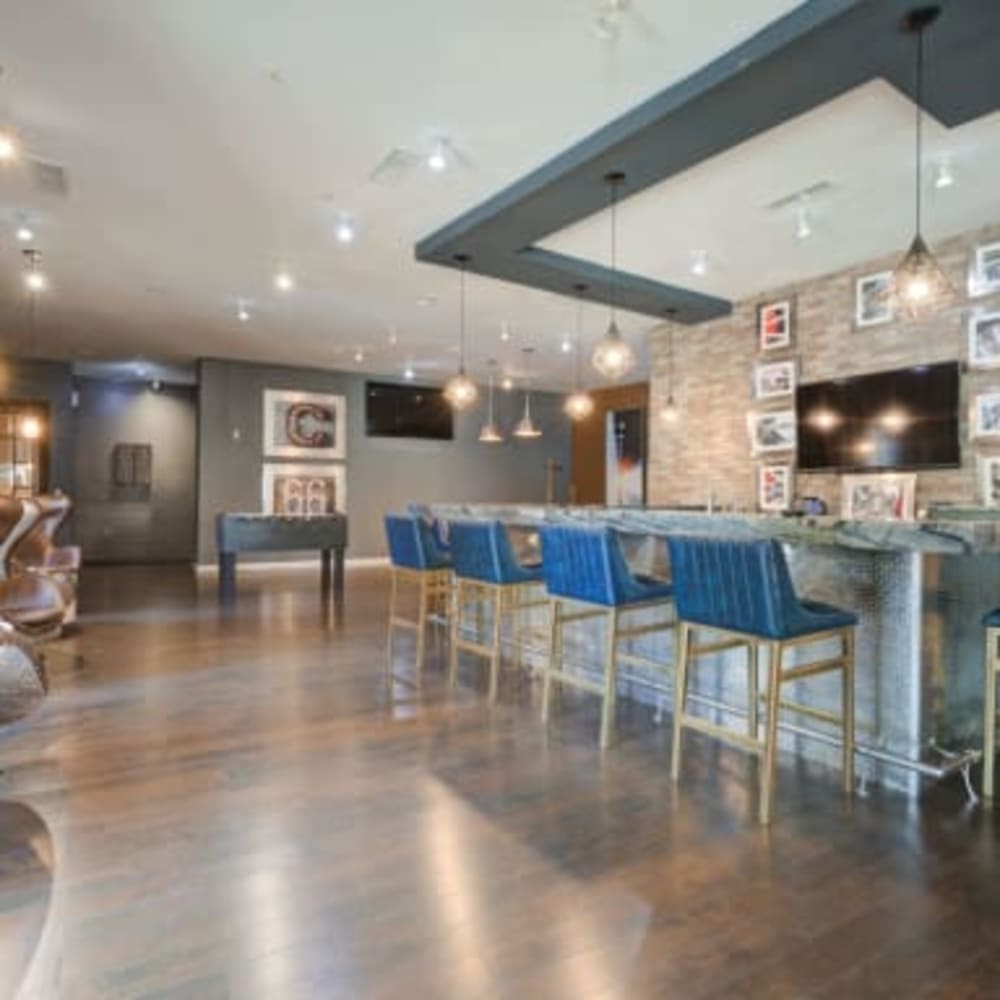 Bar seating in the clubhouse at Residences at Congressional Village in Rockville, Maryland