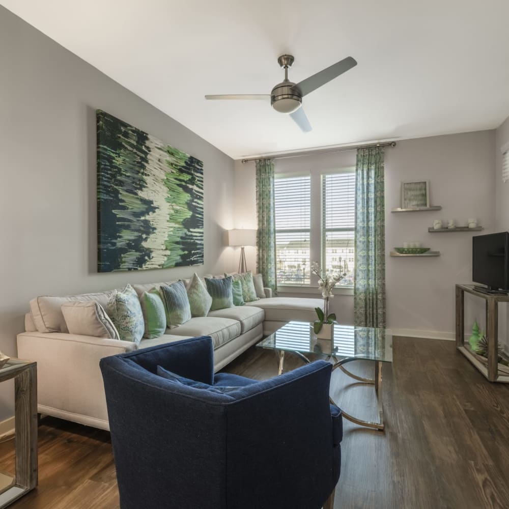 Comfortable furniture in an apartment living room at Liberty Mill in Germantown, Maryland 