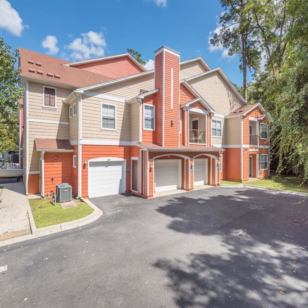 Exterior of apartments above garages at Evergreens at Mahan in Tallahassee, Florida