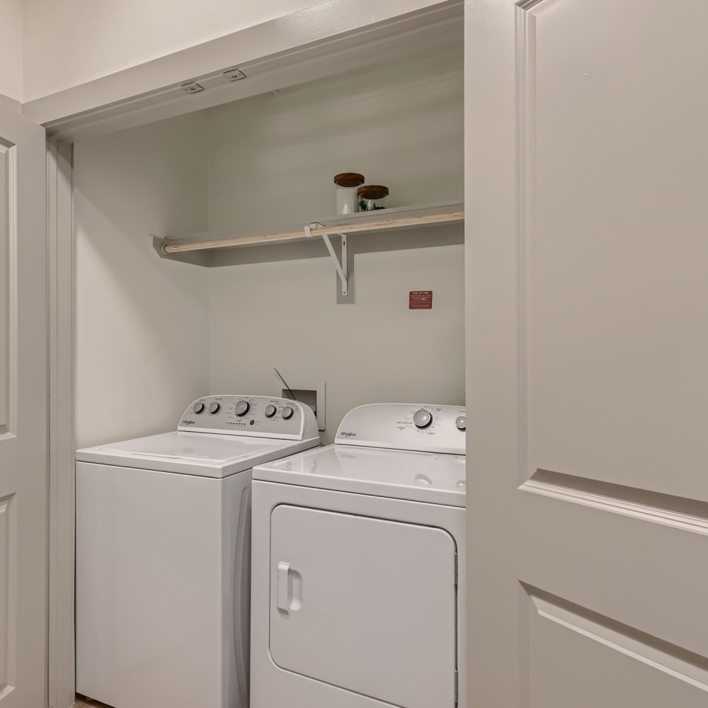 A full sized washer and dryer in an apartment at Cypress McKinney Falls in Austin, Texas
