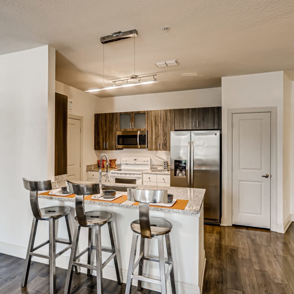 Bar seating at a kitchen island at EOS in Orlando, Florida