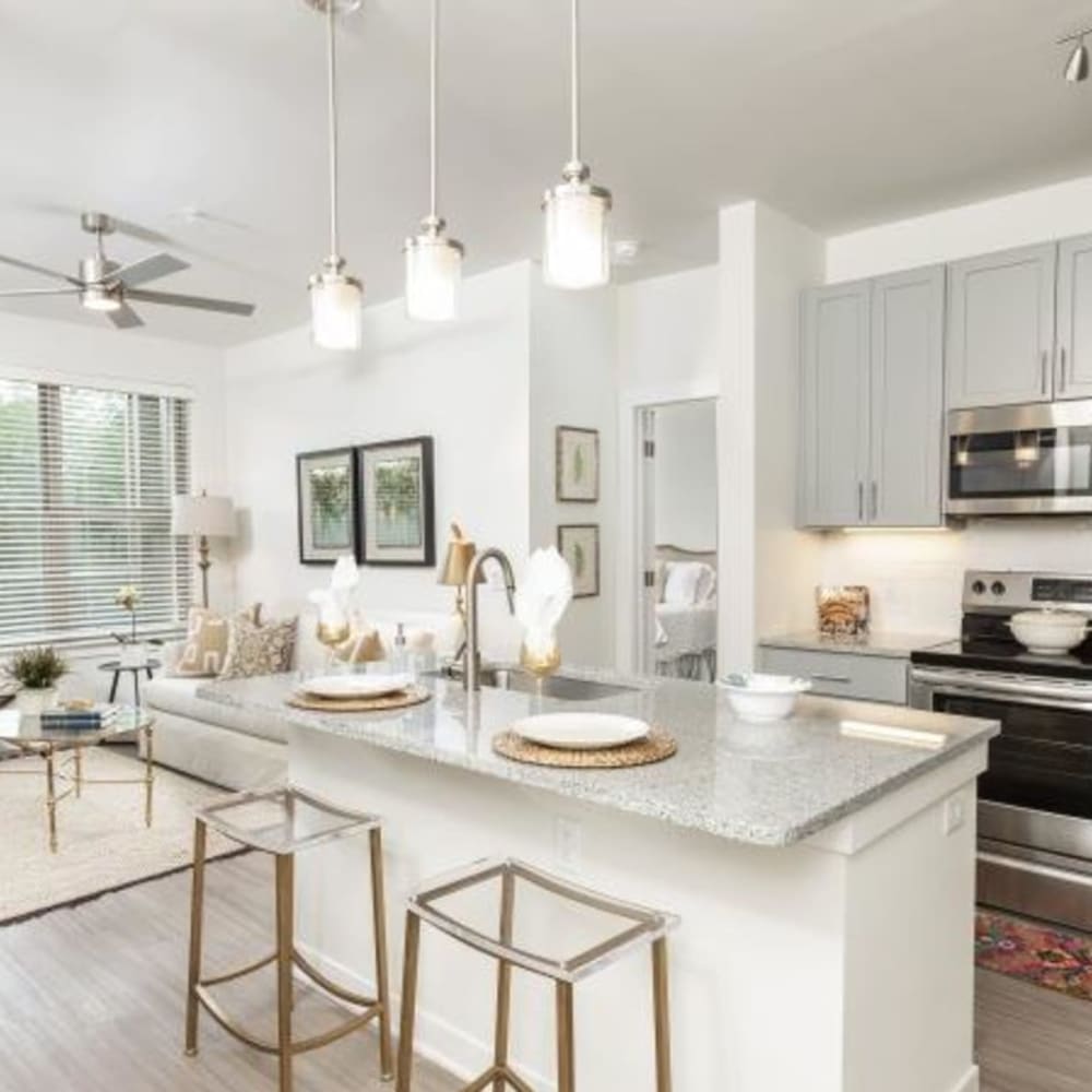 Bar seating in an apartment kitchen at Retreat at Fairhope Village in Fairhope, Alabama