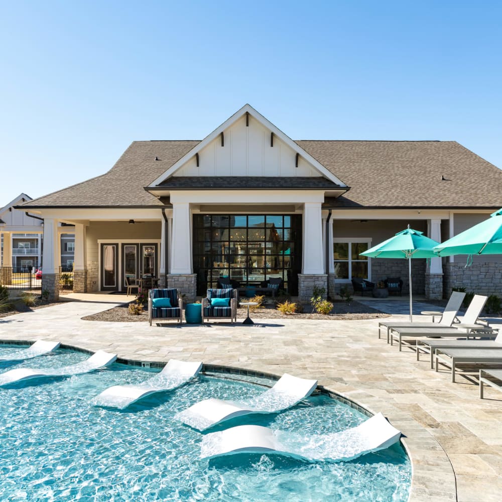 Lounge seating in the community pool at The Alexandria in Madison, Alabama