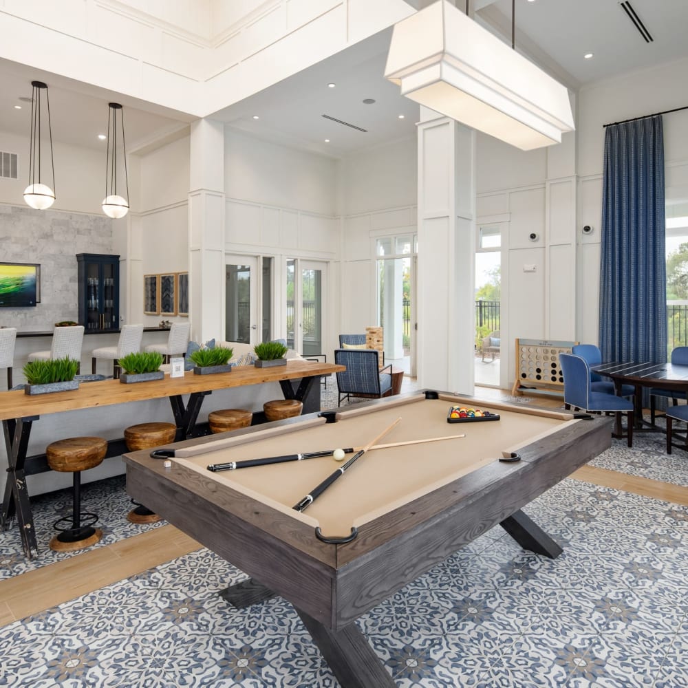 A billiards table in the clubhouse at loc.