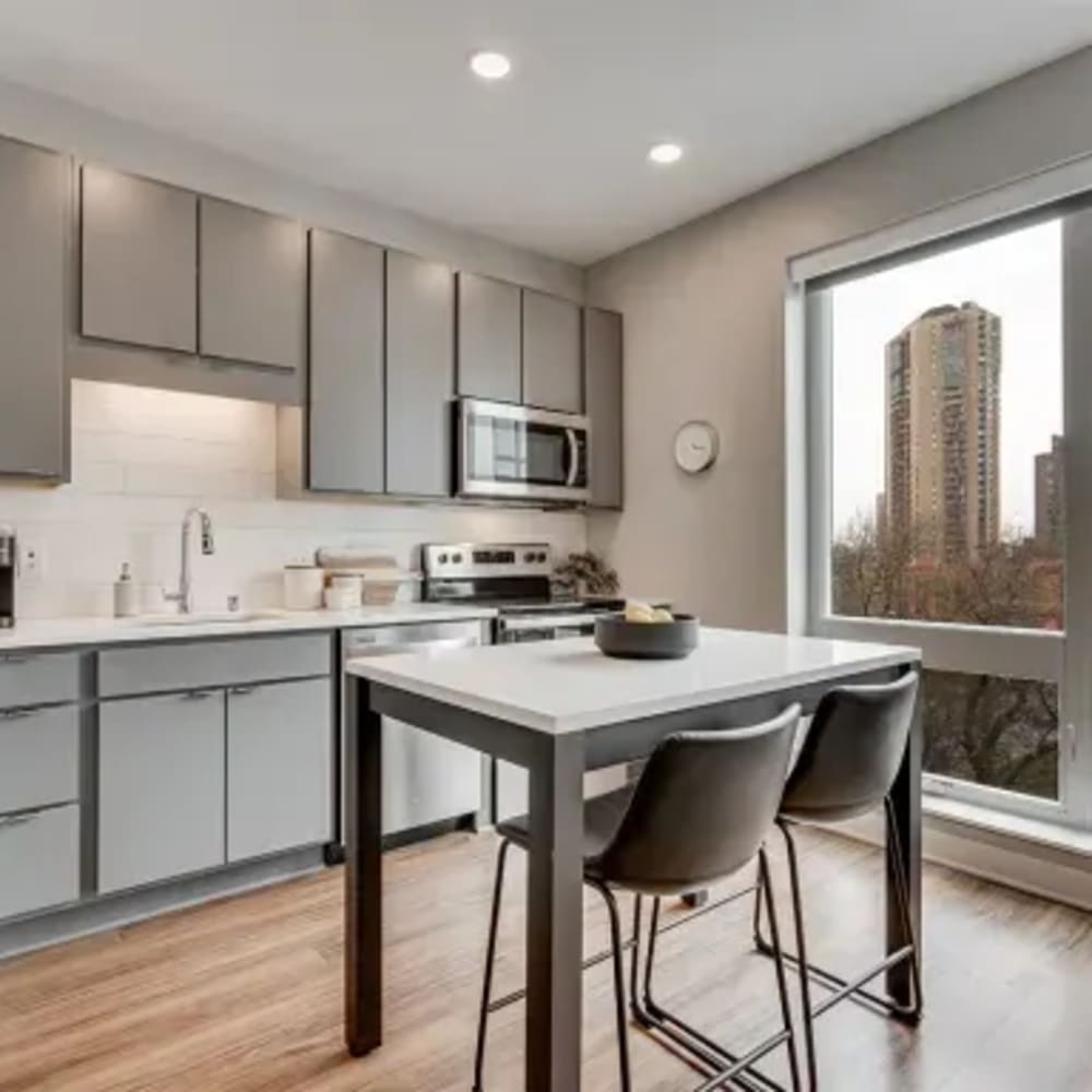 Model kitchen with a great view at Marquee Living in Minneapolis, Minnesota