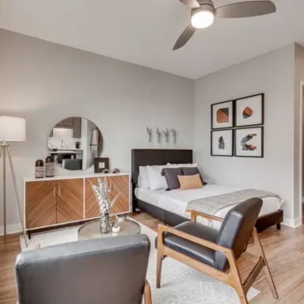 Model bedroom with ceiling fan at Marquee Living in Minneapolis, Minnesota